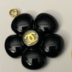 Upcycled zipper pull charm on unbranded chain